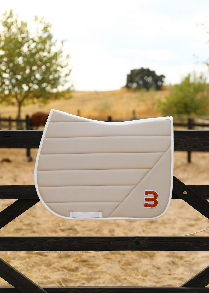Beige Teddy saddle pad jumping