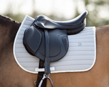 light grey saddle pad jumping