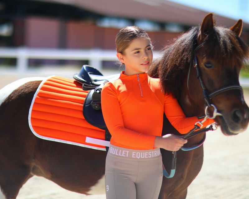 orange saddle pad pony dressage