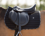 black saddle pad jumping